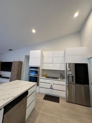 Interior, Kitchen, Recessed Lighting, Stainless Steel Appliances, Wood Texture Flooring