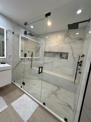 Bathroom, Glass Shower, Interior, Marble Walls, Recessed Lighting, Wood Texture Flooring