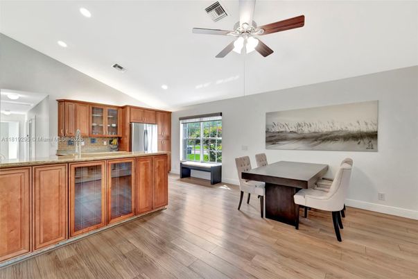 Dining room, Interior, Kitchen, Recessed Lighting, Stainless Steel Appliances, Wood Texture Flooring