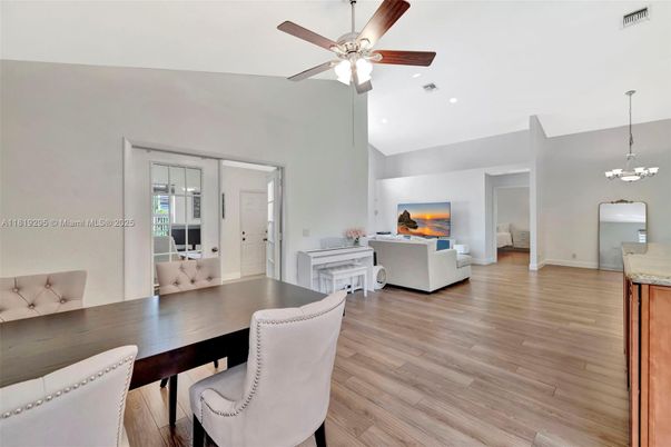 Chandelier, Dining room, Fireplace, Interior, Living room, Recessed Lighting, Wood Texture Flooring