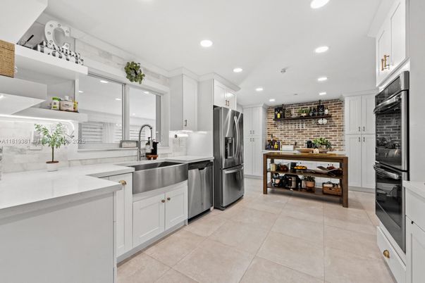 Interior, Kitchen, Recessed Lighting, Stainless Steel Appliances, Stone Walls