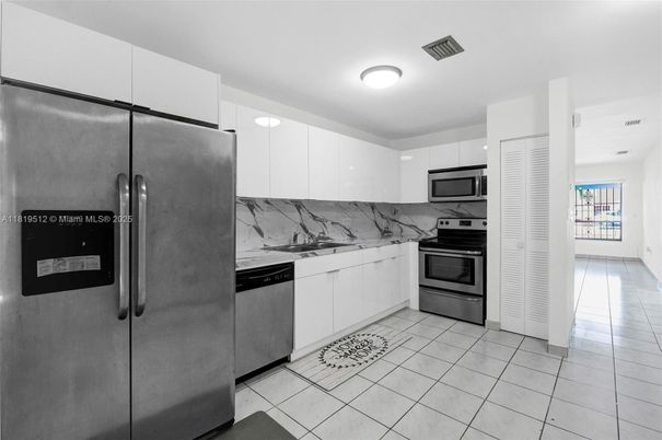 Interior, Kitchen, Marble Walls, Stainless Steel Appliances