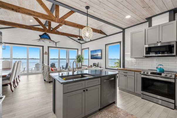 Interior, Kitchen, Pendant Lights, Recessed Lighting, Stainless Steel Appliances, Water, Wooden Beams, Wooden Ceilings, Wood Texture Flooring