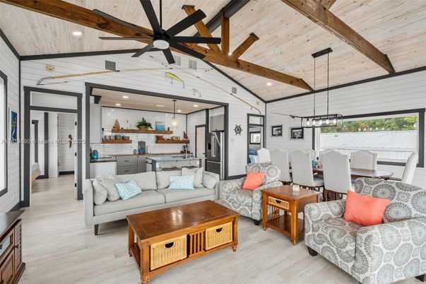 Dining room, Interior, Kitchen, Living room, Pendant Lights, Recessed Lighting, Stainless Steel Appliances, Wooden Beams, Wooden Ceilings, Wood Texture Flooring