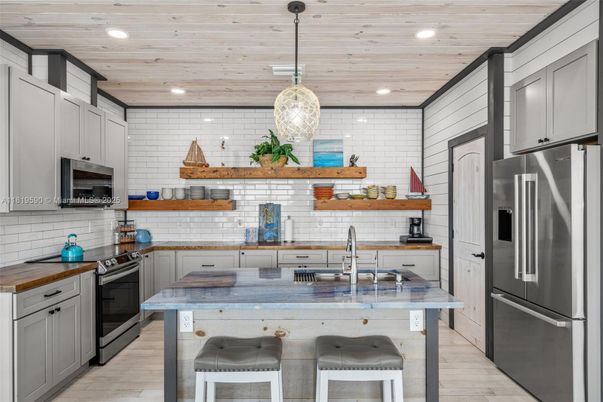 Interior, Kitchen, Pendant Lights, Recessed Lighting, Stainless Steel Appliances, Stone Walls, Wooden Ceilings, Wood Texture Flooring