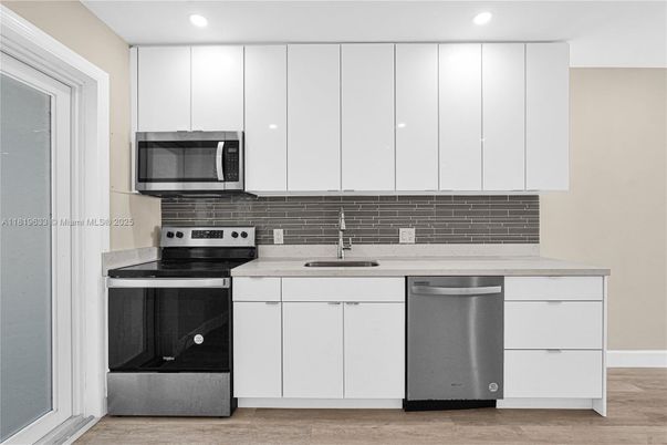 Interior, Kitchen, Recessed Lighting, Stainless Steel Appliances, Wood Texture Flooring