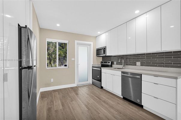 Interior, Kitchen, Recessed Lighting, Stainless Steel Appliances, Wood Texture Flooring