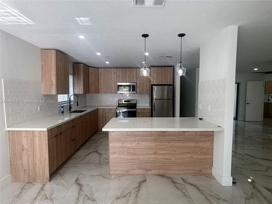 Interior, Kitchen, Marble, Pendant Lights, Recessed Lighting, Stainless Steel Appliances