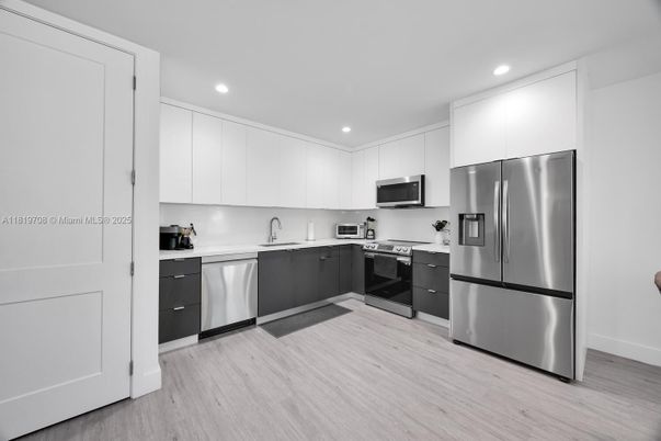Interior, Kitchen, Recessed Lighting, Stainless Steel Appliances, Wood Texture Flooring
