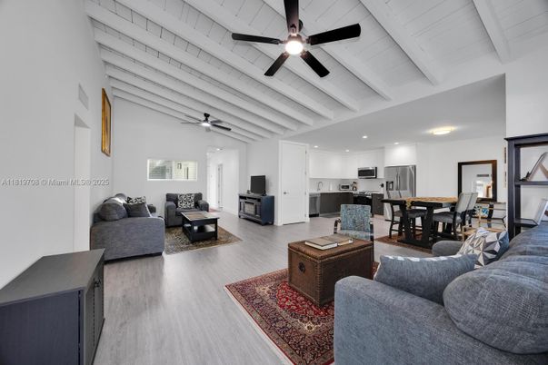 Dining room, Interior, Kitchen, Living room, Recessed Lighting, Stainless Steel Appliances, Wood Texture Flooring