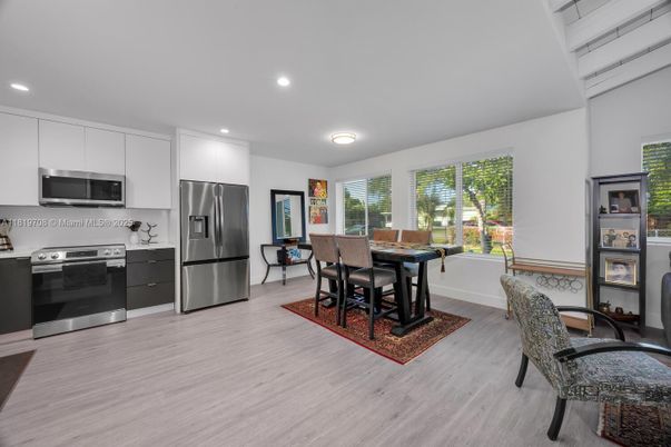 Dining room, Interior, Kitchen, Recessed Lighting, Stainless Steel Appliances, Wood Texture Flooring