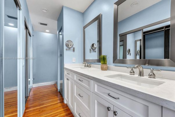 Bathroom, Dual Sink Vanities, Interior, Recessed Lighting, Wood Texture Flooring