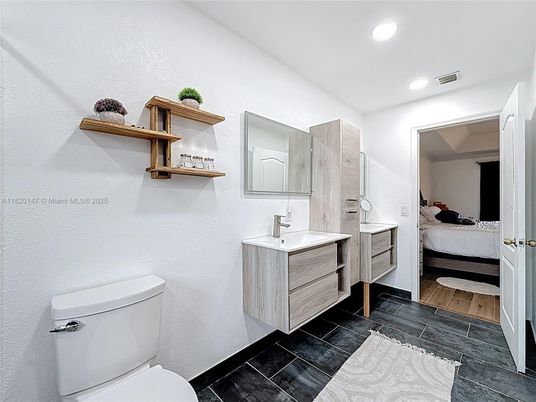 Bathroom, Bedroom, Dual Sink Vanities, Interior, Recessed Lighting, Wood Texture Flooring