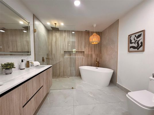 Bathroom, Dual Sink Vanities, Free Standing Baths, Glass Shower, Interior, Marble, Pendant Lights, Recessed Lighting