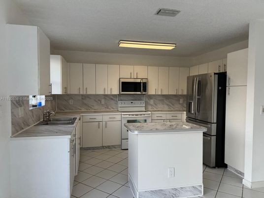 Interior, Kitchen, Marble, Marble Walls, Stainless Steel Appliances