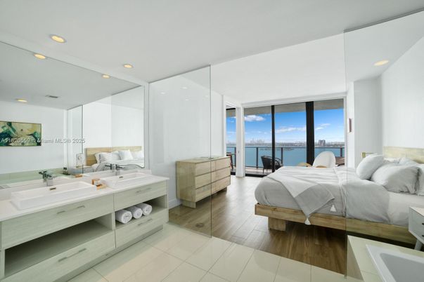 Bathroom, Bedroom, Dual Sink Vanities, Interior, Recessed Lighting, Water, Wood Texture Flooring
