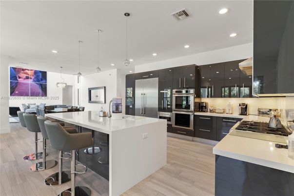 Interior, Kitchen, Pendant Lights, Recessed Lighting, Stainless Steel Appliances, Wood Texture Flooring