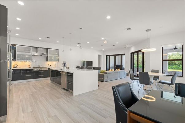 Dining room, Interior, Kitchen, Living room, Pendant Lights, Recessed Lighting, Stainless Steel Appliances, Wood Texture Flooring
