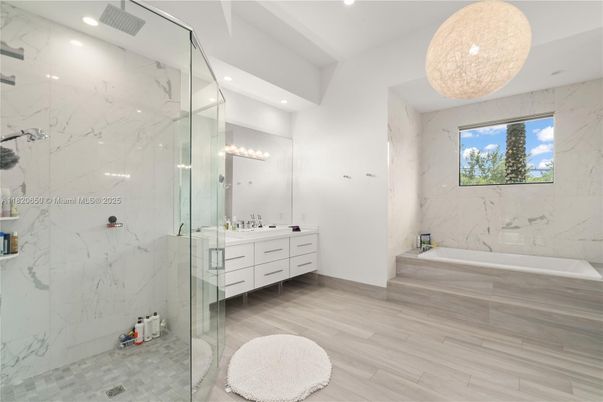 Bathroom, Glass Shower, Interior, Marble Walls, Pendant Lights, Recessed Lighting, Wood Texture Flooring