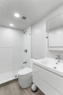 Bathroom, Glass Shower, Interior, Recessed Lighting, Wood Texture Flooring
