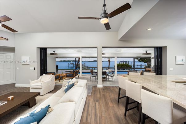 Dining room, Interior, Living room, Recessed Lighting, Water, Wood Texture Flooring