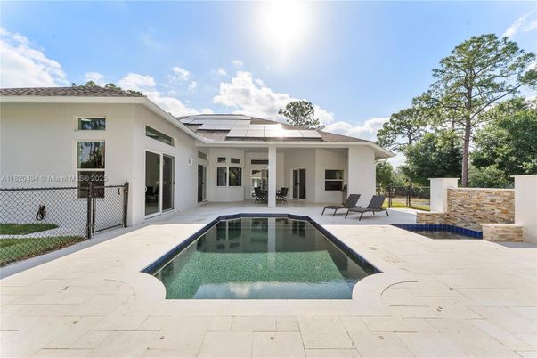 Exterior, Pool, Solar Panels