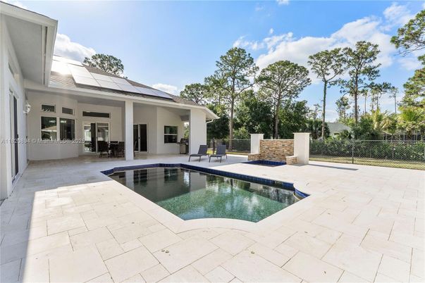 Exterior, Pool, Solar Panels