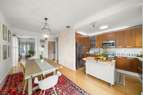 Dining room, Interior, Kitchen, Pendant Lights, Recessed Lighting, Stainless Steel Appliances, Wood Texture Flooring