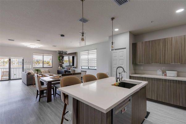 Dining room, Interior, Kitchen, Living room, Pendant Lights, Recessed Lighting, Wood Texture Flooring