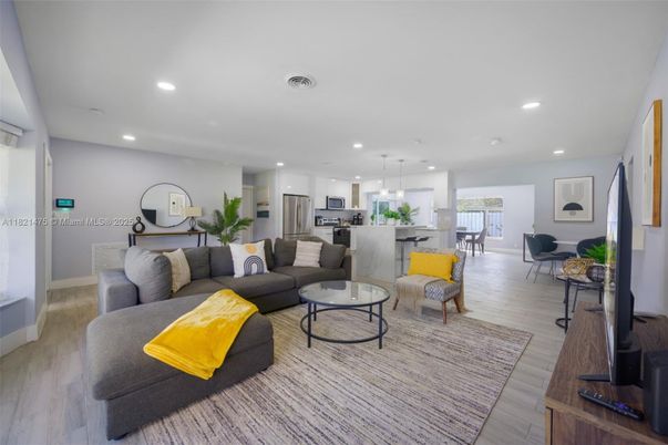 Dining room, Interior, Kitchen, Living room, Pendant Lights, Recessed Lighting, Stainless Steel Appliances, Wood Texture Flooring