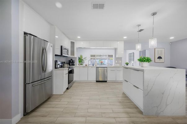 Interior, Kitchen, Pendant Lights, Recessed Lighting, Stainless Steel Appliances, Wood Texture Flooring