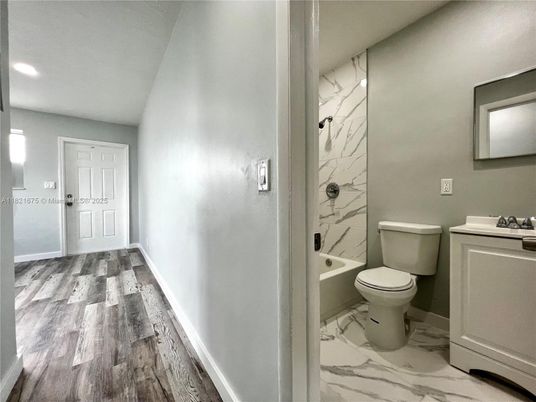 Bathroom, Interior, Marble, Marble Walls, Recessed Lighting, Wood Texture Flooring