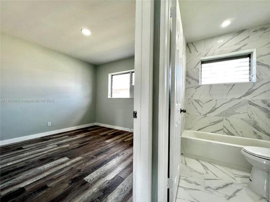 Bathroom, Interior, Marble, Marble Walls, Recessed Lighting, Wood Texture Flooring