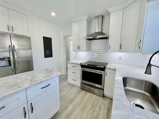 Interior, Kitchen, Recessed Lighting, Stainless Steel Appliances, Wood Texture Flooring