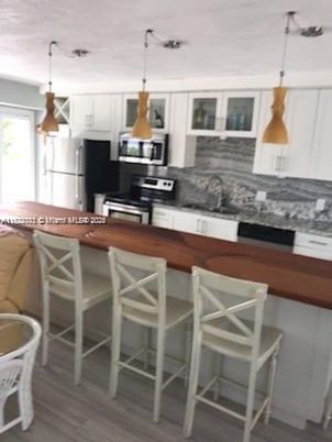 Interior, Kitchen, Pendant Lights, Stainless Steel Appliances, Wood Texture Flooring