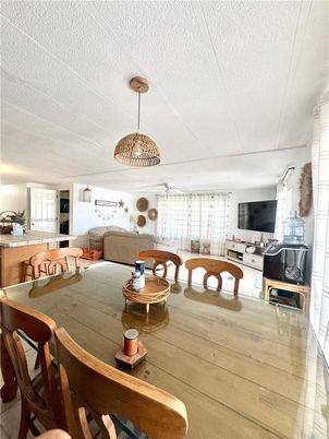 Dining room, Interior, Living room, Pendant Lights, Wood Texture Flooring