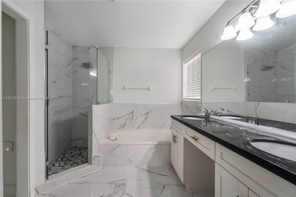 Bathroom, Dual Sink Vanities, Glass Shower, Interior, Marble, Marble Walls