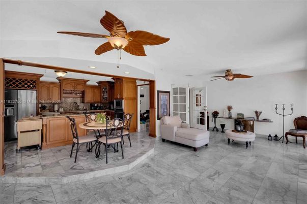 Dining room, Interior, Kitchen, Living room, Marble, Recessed Lighting, Stainless Steel Appliances