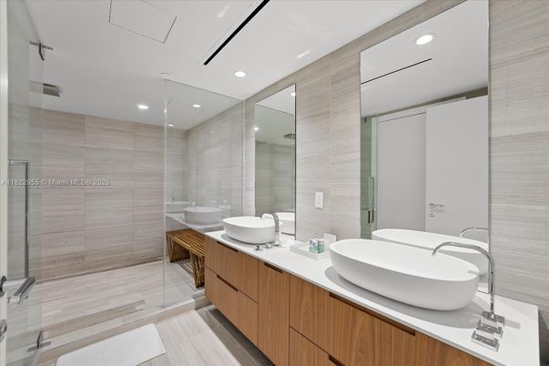 Bathroom, Dual Sink Vanities, Glass Shower, Interior, Recessed Lighting, Wood Texture Flooring