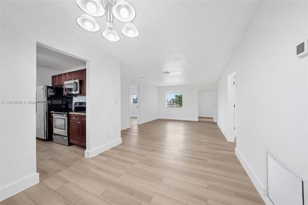 Chandelier, Empty room, Interior, Kitchen, Stainless Steel Appliances, Wood Texture Flooring