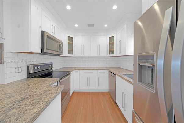 Interior, Kitchen, Recessed Lighting, Stainless Steel Appliances, Wood Texture Flooring