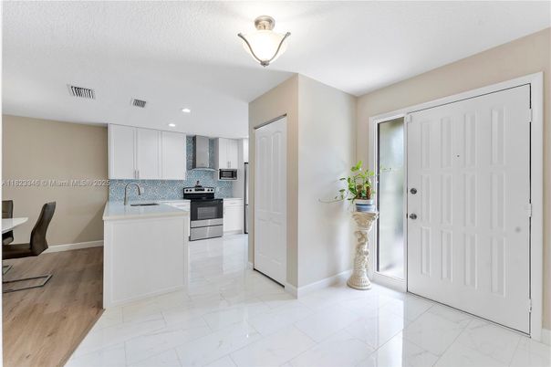 Interior, Kitchen, Marble, Recessed Lighting, Stainless Steel Appliances