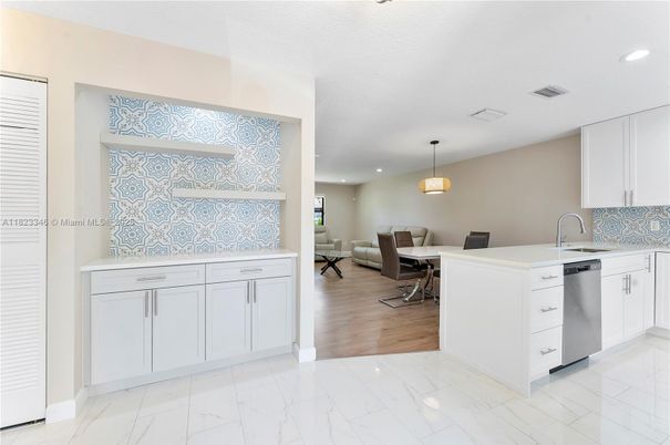 Dining room, Interior, Kitchen, Marble, Pendant Lights, Recessed Lighting, Stainless Steel Appliances
