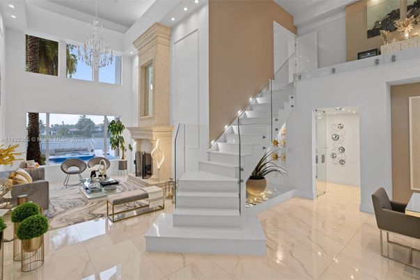 Chandelier, Fireplace, Interior, Living room, Marble, Recessed Lighting, Water