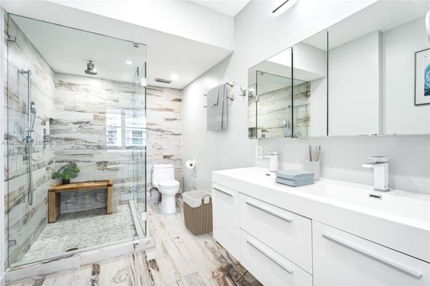 Bathroom, Dual Sink Vanities, Glass Shower, Interior, Marble, Recessed Lighting