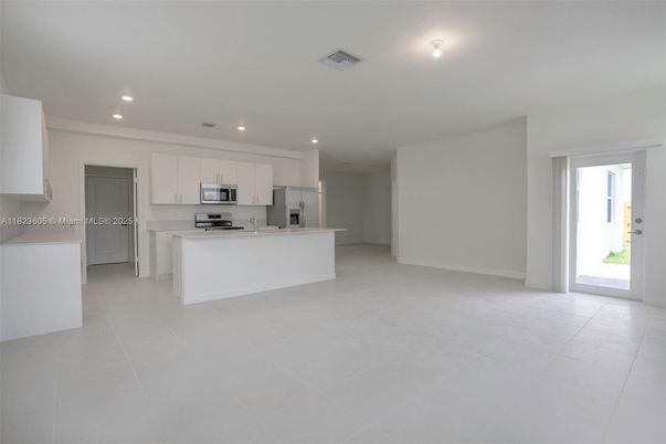 Empty room, Interior, Kitchen, Recessed Lighting, Stainless Steel Appliances
