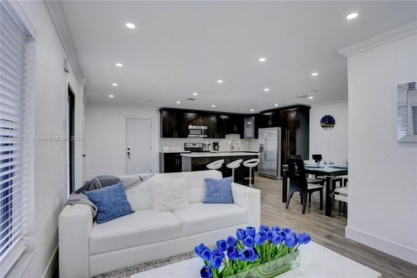 Dining room, Interior, Kitchen, Living room, Recessed Lighting, Stainless Steel Appliances, Wood Texture Flooring