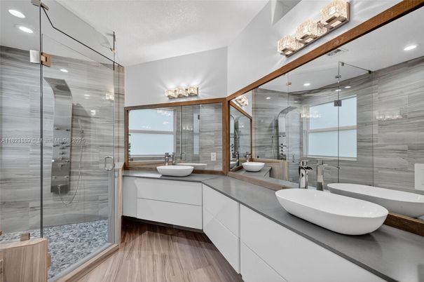 Bathroom, Dual Sink Vanities, Glass Shower, Interior, Recessed Lighting, Wood Texture Flooring