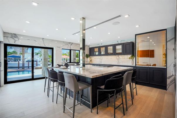 Interior, Kitchen, Marble Walls, Recessed Lighting, Water, Wood Texture Flooring