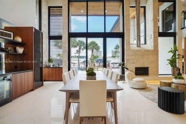 Dining room, Fireplace, Interior, Recessed Lighting, Stone Walls, Water